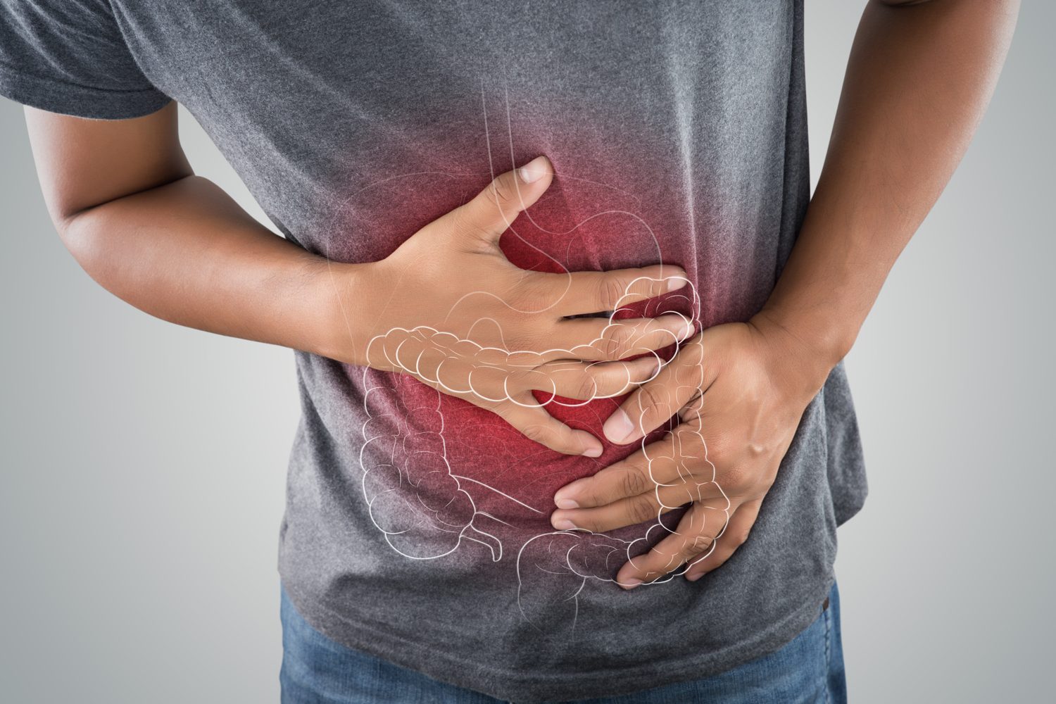 Man holding his abdomen, with the bowel illustrated