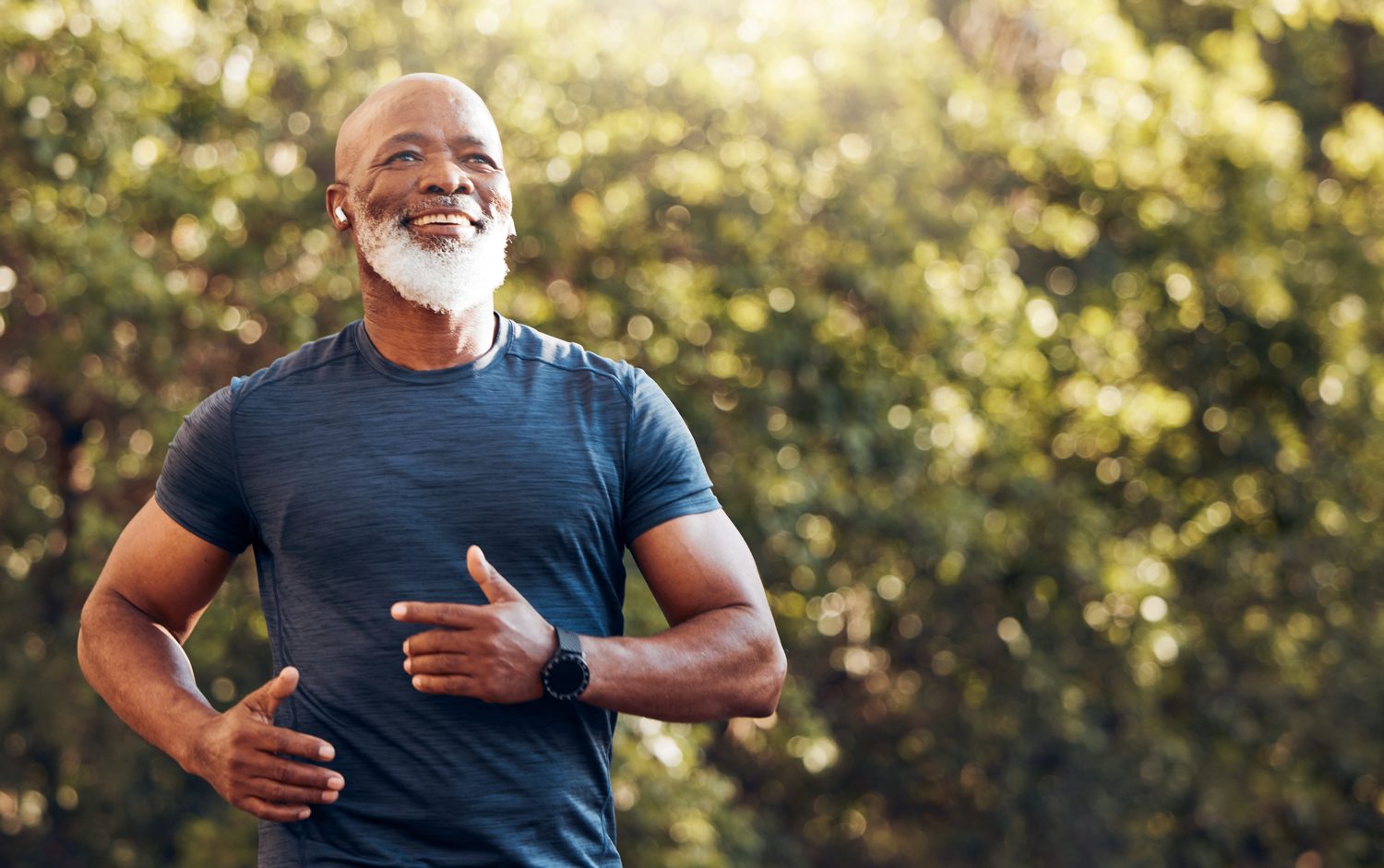 Older man jogging outdoors