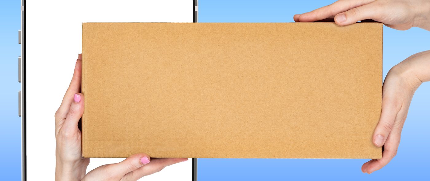A test kit handed out of a phone screen