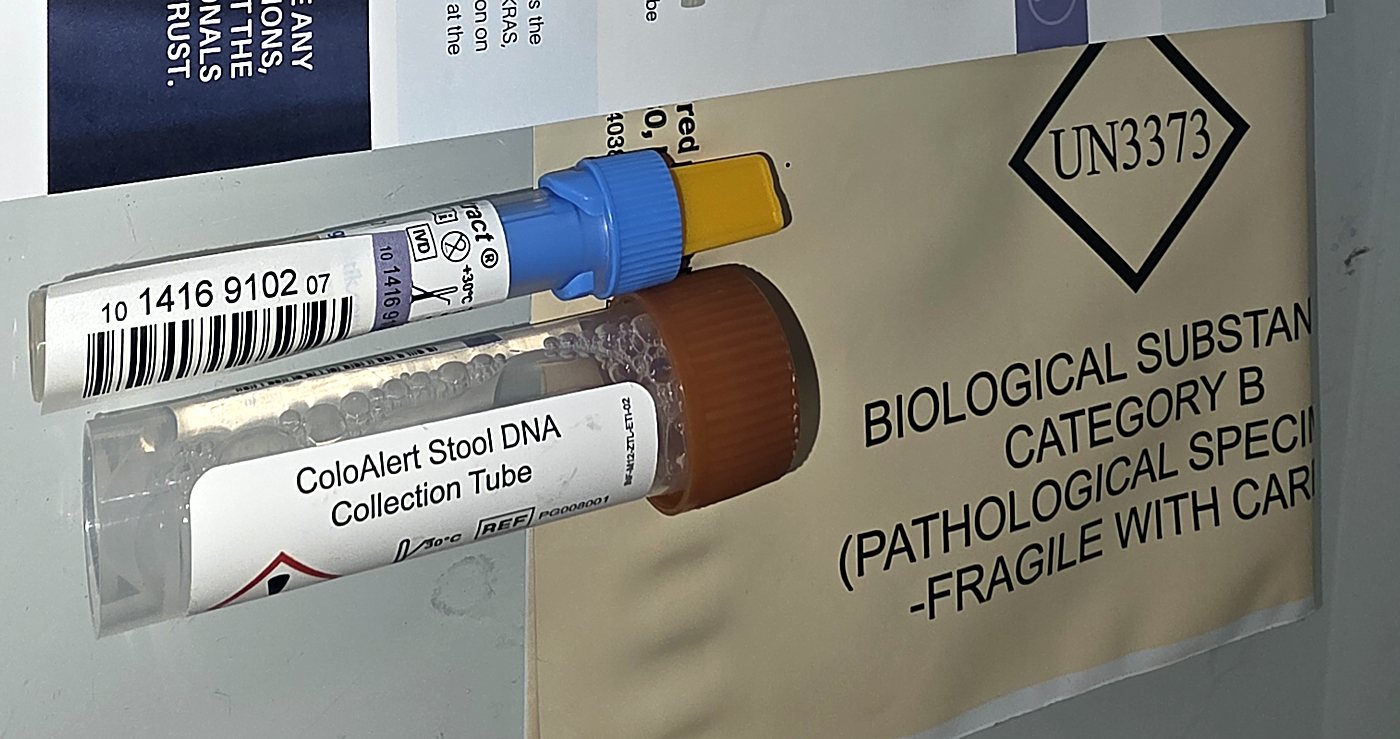 The prepaid UN3373 return packaging with the two sample tubes
